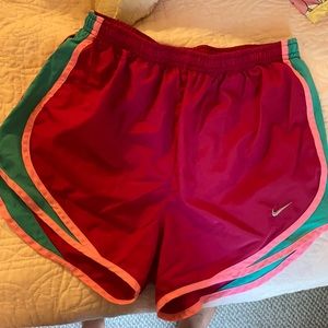 Women’s Nike running shorts dark pink size S